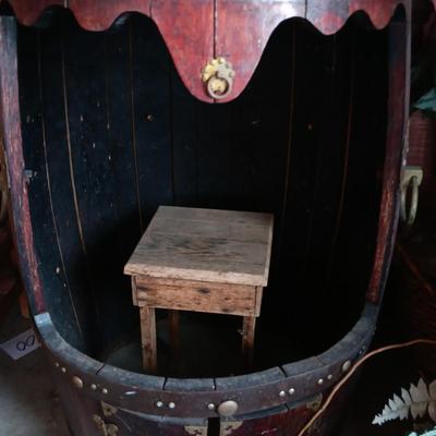LARGE WHISKEY BARREL THAT HAS BEEN MODIFIED