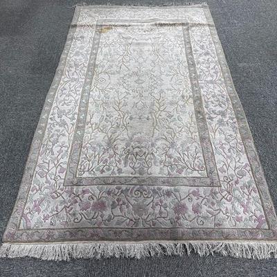 Pink Flowered rug.