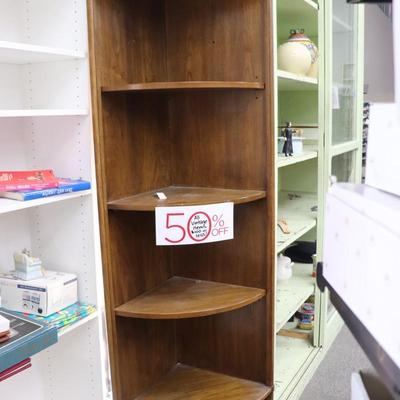 Corner Shelf Brown in color