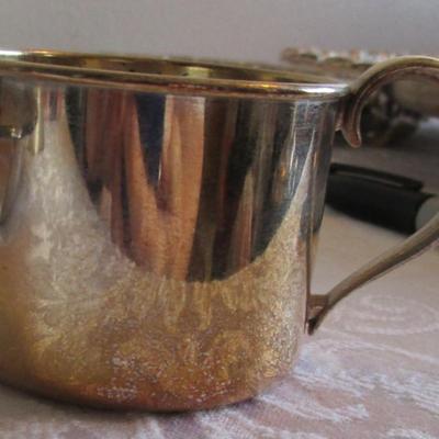 Silver-plated bell, cup, and vintage candle holder