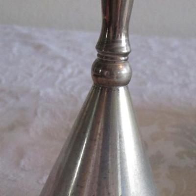 Silver-plated bell, cup, and vintage candle holder