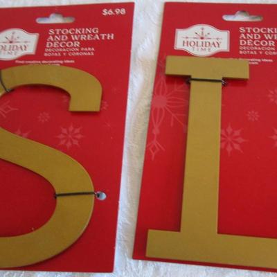 Light-up bracelet; 3 sm pkg tissue paper;2 metal letter (S & L); peel & stick gift tags; thank you notes