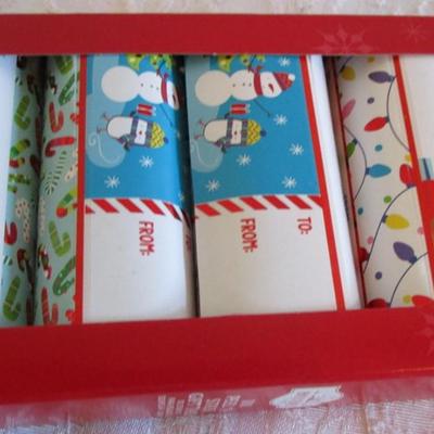 Light-up bracelet; 3 sm pkg tissue paper;2 metal letter (S & L); peel & stick gift tags; thank you notes