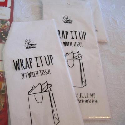 Light-up bracelet; 3 sm pkg tissue paper;2 metal letter (S & L); peel & stick gift tags; thank you notes
