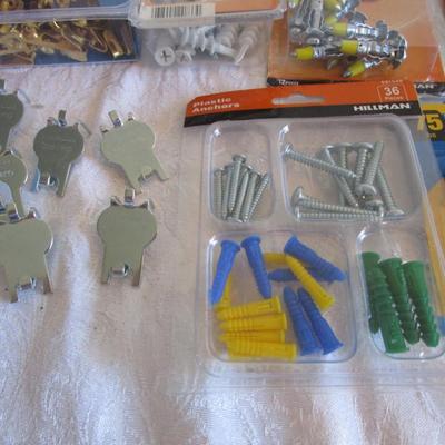 Picture hangers, anchors and screws