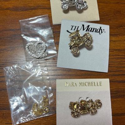 Earrings, necklaces, pins