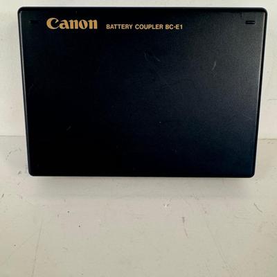 Lot 10. Canon Battery Coupler