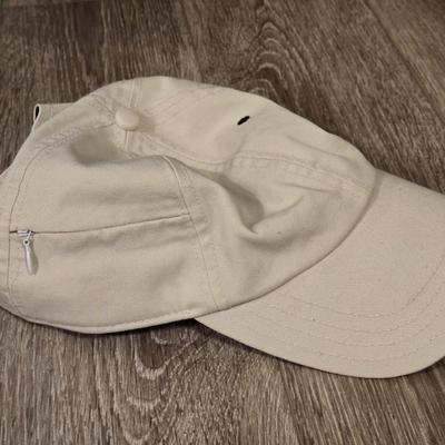 (2) Hats - One Light Tan Cotton Hat and One Orange Marmot Nylon Hat