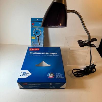 Lot 32. Paper, Magnifying Glass and Clip-on Lamp