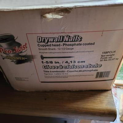Nearly full box 1 5/8" siding nails