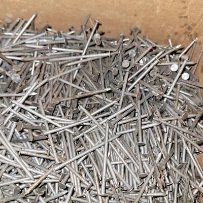Two partial boxes 2.5" nails and a bag of 2" galvanized