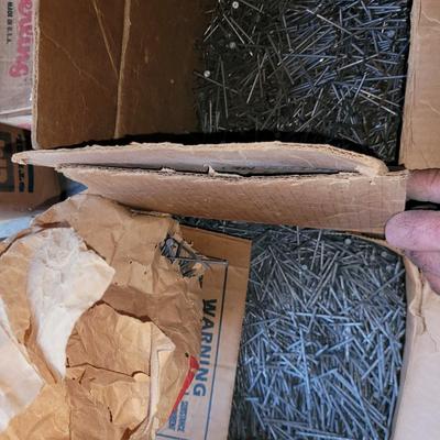 Two partial boxes 2.5" nails and a bag of 2" galvanized