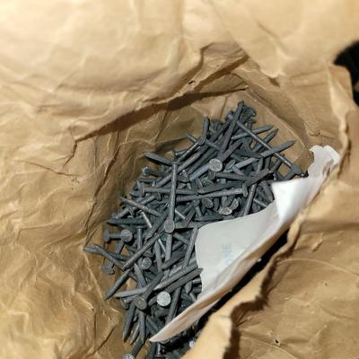 Two partial boxes 2.5" nails and a bag of 2" galvanized