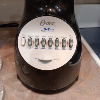 OSTER BLENDER, 7 CRYSTAL DRINKING GLASSES AND 3 STEMMED GLASSES