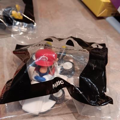SEALED DISNEY AND MARIO BROS MCDONALD'S HAPPY MEAL TOYS