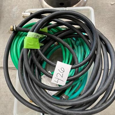 Bin W/Bundle Of Water Hoses