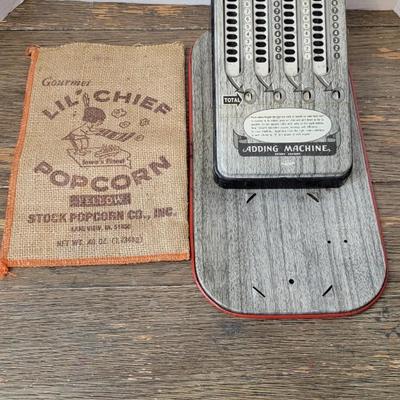 Vintage adding machine and popcorn bag