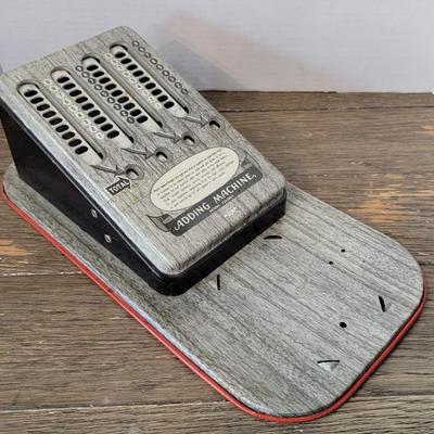 Vintage adding machine and popcorn bag
