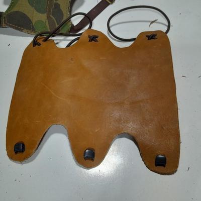 Arrows and wrist guards for a bow - At least a dozen arrows