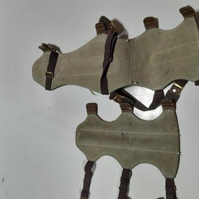 Arrows and wrist guards for a bow - At least a dozen arrows
