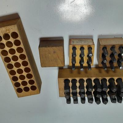 Sets of Machine-made Steel stamps in wooden organizer boxes