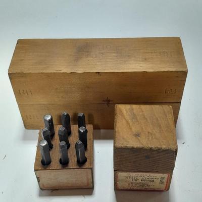 Sets of Machine-made Steel stamps in wooden organizer boxes