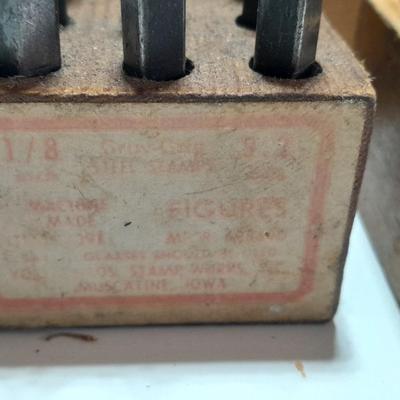 Sets of Machine-made Steel stamps in wooden organizer boxes