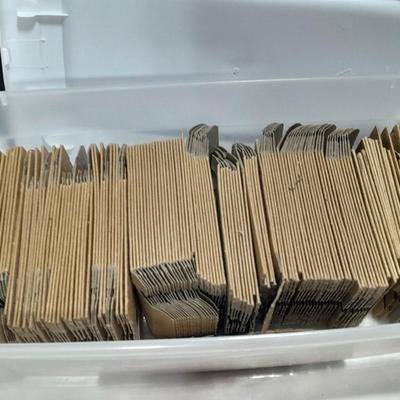 Small tote of cardboard Ammunition sleeves