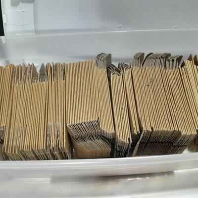 Small tote of cardboard Ammunition sleeves