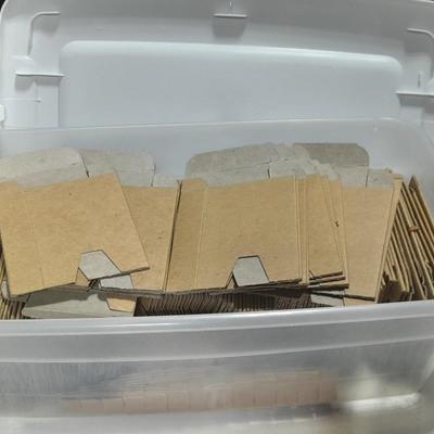 Small tote of cardboard Ammunition sleeves