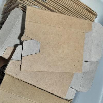 Small tote of cardboard Ammunition sleeves