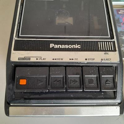 Variety of cassette tapes with cassette player