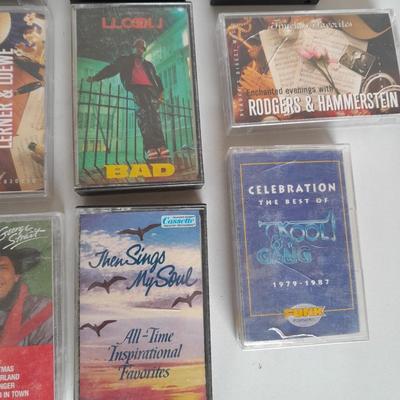 Variety of cassette tapes with cassette player