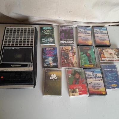 Variety of cassette tapes with cassette player