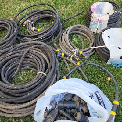 Lot of soaker hoses with fittings