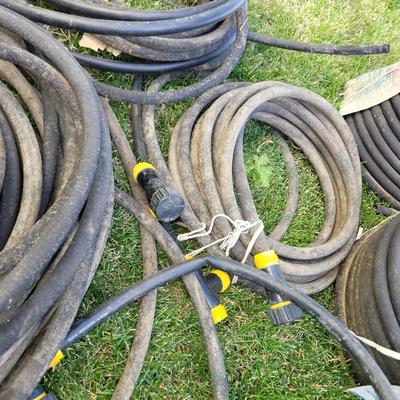 Lot of soaker hoses with fittings