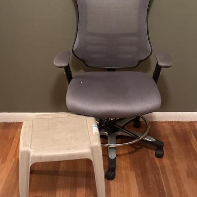 Office chair and plastic table