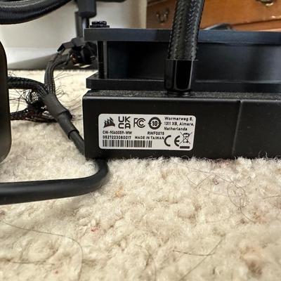 AN ASSORTMENT OF COMPUTER/ELECTRONIC CORDS AND FANS
