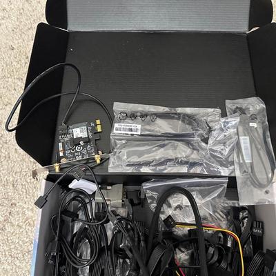 AN ASSORTMENT OF COMPUTER/ELECTRONIC CORDS AND FANS
