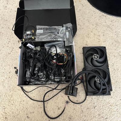 AN ASSORTMENT OF COMPUTER/ELECTRONIC CORDS AND FANS