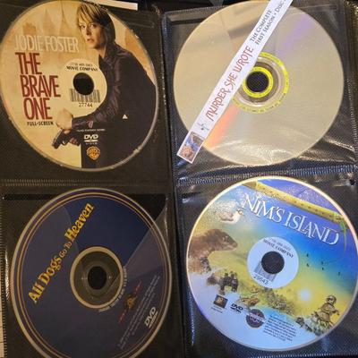 Large DVD Lot including on Portable DVD Holder with DVDs inside