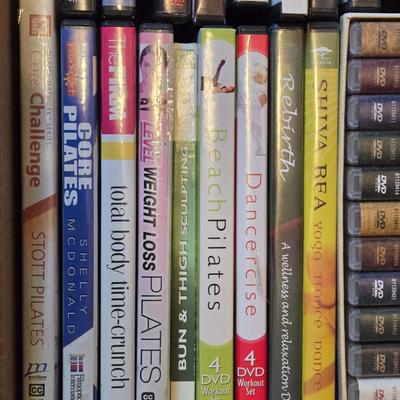 Large DVD Lot including on Portable DVD Holder with DVDs inside