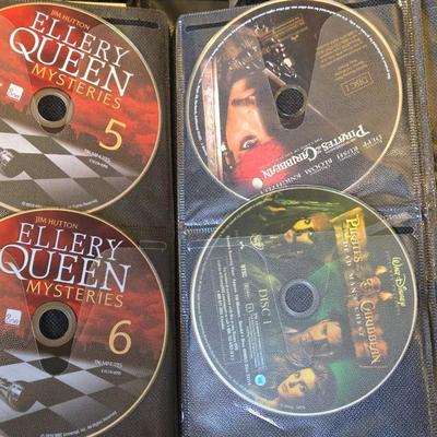 Large DVD Lot including on Portable DVD Holder with DVDs inside