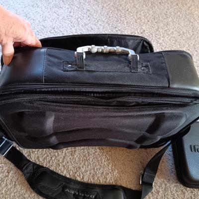 OAKLEY SOFT SIDED BRIEFCASE AND UNIDEN ZIPPERED CASE