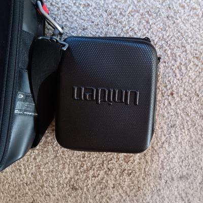 OAKLEY SOFT SIDED BRIEFCASE AND UNIDEN ZIPPERED CASE