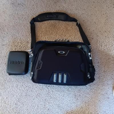 OAKLEY SOFT SIDED BRIEFCASE AND UNIDEN ZIPPERED CASE