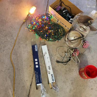 Sale Photo Thumbnail #504: 2 new 18 inch grab BA few strings of Christmas lights and they all seem to work. Heat lamp without a bulb 2 pumps 1 tested and working the other, didn't power on vintage fan box of newer Christmas display lights. Note the yellow shoplight/treble lightis n