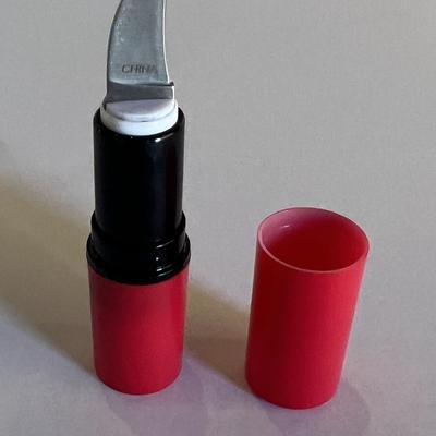 Lipstick case pocket knife prop