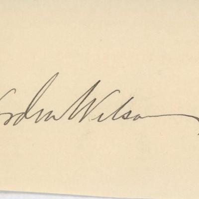 Woodrow Wilson signature cut. GFA Authenticated