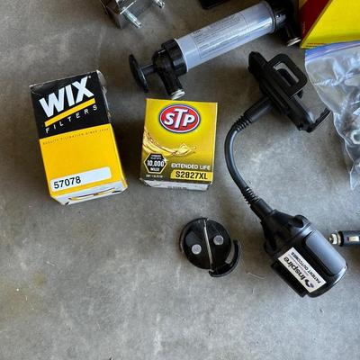 GSPSCN PROFESSIONAL TIRE INFLATOR, LUG NUTS, OIL AND FUEL FILTER, GLOVES, MUFFLER CLAMP AND OTHER ITEMS